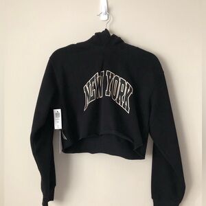 Aritzia TNA Cropped Hoodie with New York logo - Size S - NWT